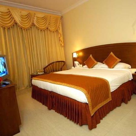 Hotel Aj International Bangalore Zimmer foto